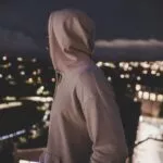 person in gray pullover hoodie photography
